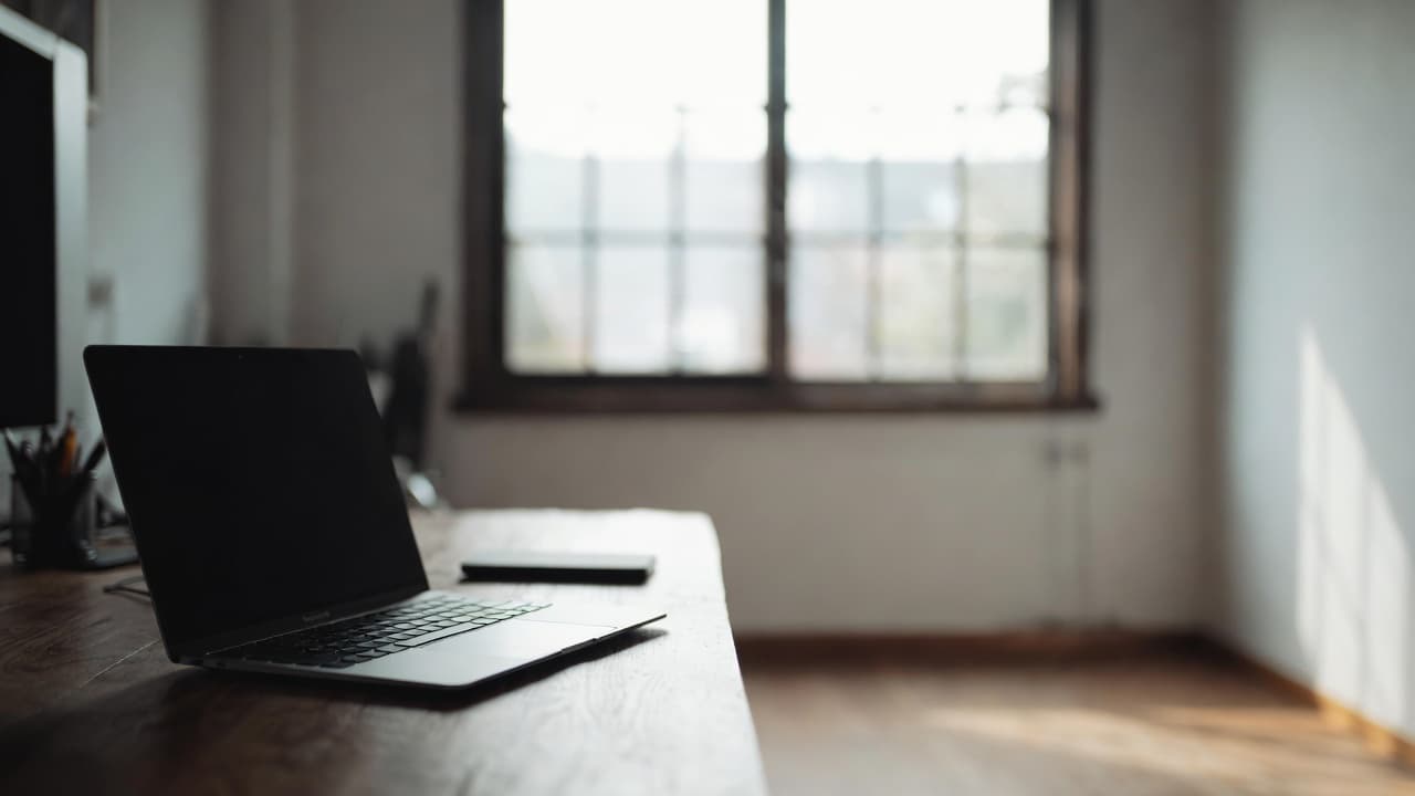 Minimalist workspace with laptop for productive work